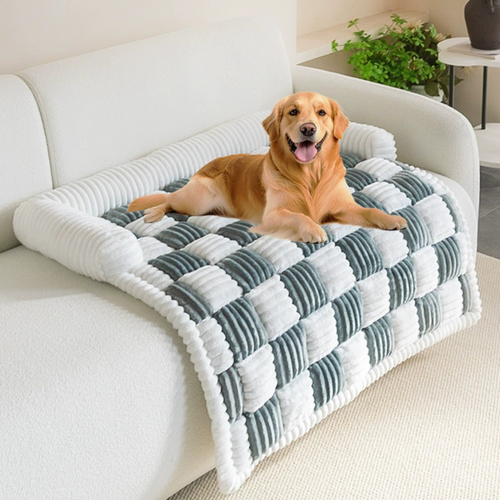 Fluffy Fuzzy Calming Dog Bed Sofa Protector Pet Mat Dog lying on a checkered pet bed in a living room
