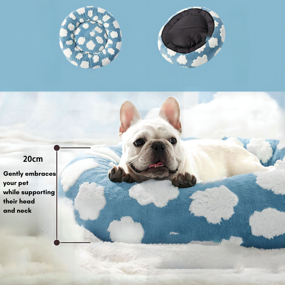 CozyPaw Donut Dog Bed – Modern Design, Soft & Warm, Washable Dog lying on a blue cloud-patterned pet bed with circular insets showing the product's design.