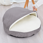 Calming Ultimate Anti-Anxiety Dog Bed – Cozy Hooded BedGray pet bed with white interior on a light wooden floorJoypup