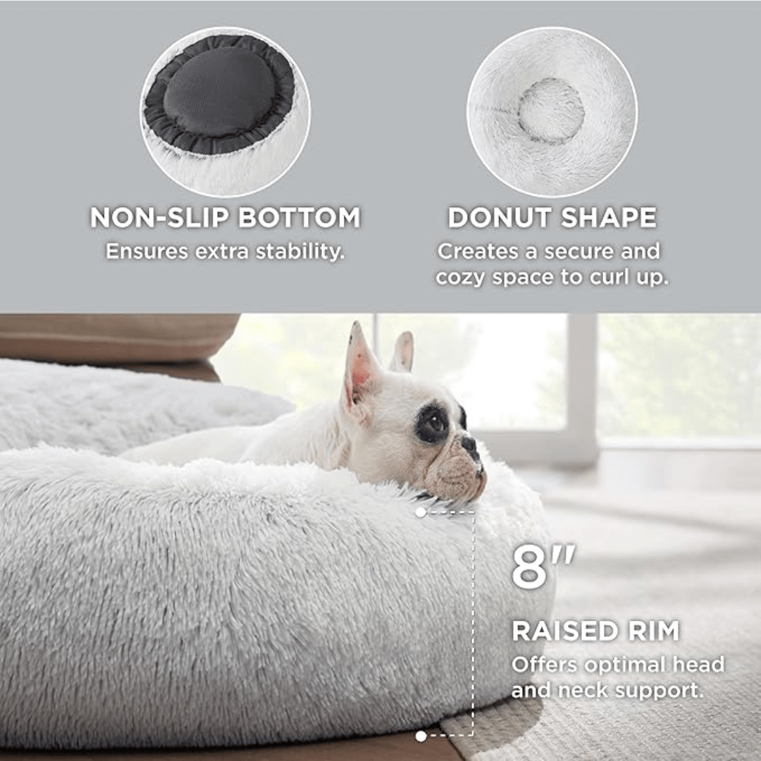 Soft Donut Cuddler Pet Bed - Ultimate Anti-AnxietyDog lying on a raised pet bed with features highlighted.Joypup