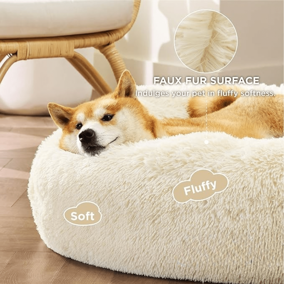 Dog lying on a fluffy white pet bed with text highlighting the faux fur surface and softness.