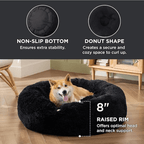 Soft Donut Cuddler Pet Bed - Ultimate Anti-AnxietyDog lying on a black donut-shaped pet bed with features highlighted.Joypup