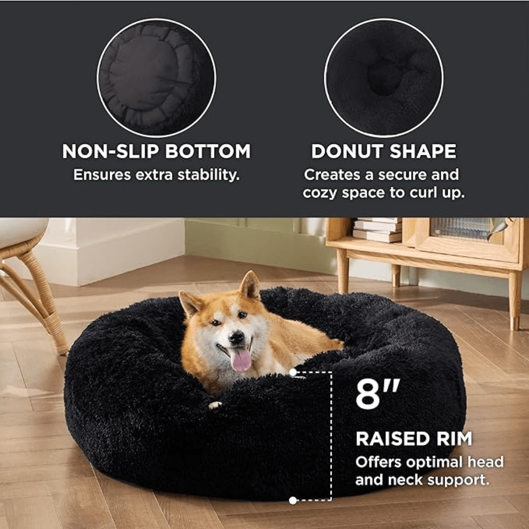 Soft Donut Cuddler Pet Bed - Ultimate Anti-AnxietyDog lying on a black donut-shaped pet bed with features highlighted.Joypup