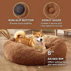 Soft Donut Cuddler Pet Bed - Ultimate Anti-AnxietyDog lying on a brown donut-shaped pet bed with features highlighted.Joypup