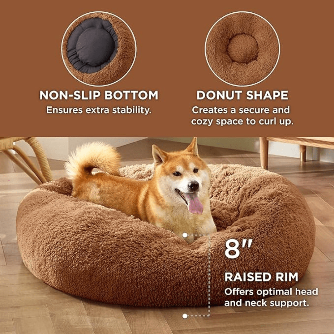 Soft Donut Cuddler Pet Bed - Ultimate Anti-AnxietyDog lying on a brown donut-shaped pet bed with features highlighted.Joypup